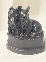 Front view of cast iron double terrier doorstop