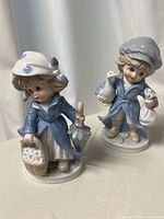 Both KPM figurines, full view