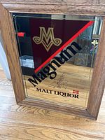 Full view of framed Miller Magnum Malt Liquor mirror sign