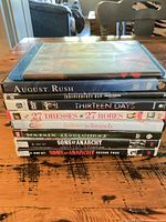 Stack of all nine DVD and Blu-ray cases