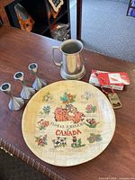 Overview of all items: platter, tankard, 3 candle holders, boxed opener, chocolates