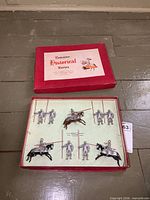 Closed red Britains Historical Series box and open tray showing six knights