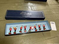 Full view of open Britains box with eight band figures