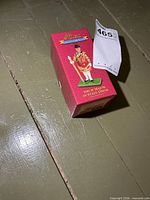 Closed red W. Britain Collectors Club box showing figure illustration