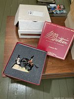 Closed red Britains Special Collectors Edition box, foam insert holding figures, outer white sleeve visible