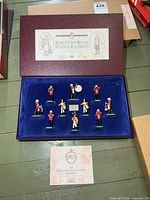 Presentation box closed showing title and crest