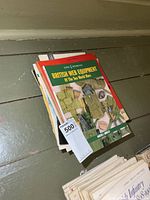 Stack of military books, leading title British Web Equipment Of The Two World Wars