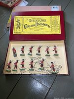 Closed presentation box showing title label
