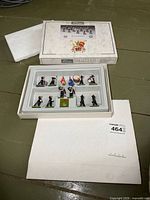 Closed and open presentation box showing tray with 10 Britains Royal Marines Band figures