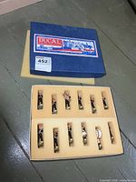 Closed Ducal box and foam tray showing 12 figures