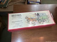 Closed box showing Historex branding and artwork of wagon