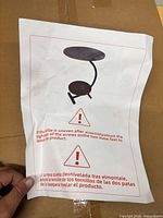 Instruction sheet illustrating assembled two-tier side table