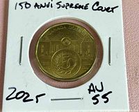 Reverse of coin in holder showing Supreme Court design and 150 logo