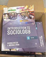 Front covers of textbooks showing title, edition and authors