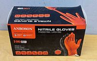 Front of sealed ANBOSON nitrile gloves box showing brand, quantity, features