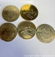 Five Olympic Trust of Canada equestrian tokens obverse and reverse visible