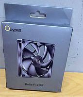 Front of sealed Ocypus Delta F12 BK fan retail box