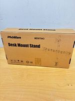 Front of closed retail box showing brand, model MD97843 and product illustration