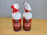 Front view of both Expert Grill cleaner bottles