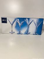Retail box showing Mikasa set of four martini glasses with varied patterns