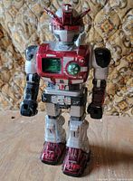 Full view of robot showing colour scheme and overall condition