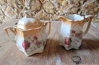 Sugar bowl and creamer showing overall design