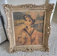 Front view of ornate gold frame with Huldah Cherry Jeffe print