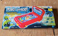 Front of sealed Robot Invader Electronic Pinball Game box