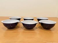 Six cobalt blue bowls grouped side view