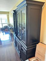Right side view showing overall cabinet form and finish