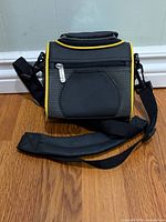 Full view of Kodak black nylon camera bag with shoulder strap