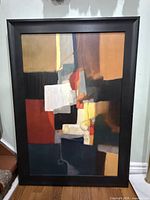 Front view of framed abstract painting
