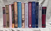 All 13 Folio Society books standing spine-out in slipcases