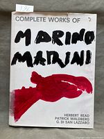Front dust jacket of the book showing title and authors