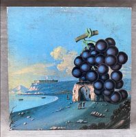 Front cover featuring coastal artwork with large grape cluster