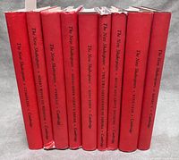 Spines of nine red Cambridge New Shakespeare volumes