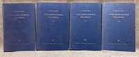 Front covers of all four volumes