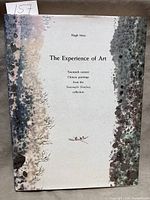 Front of dust-jacketed book with title, author and mottled design