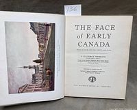 Open book showing colour plate and title page