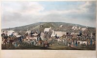 wide scene of horse race course with spectators and horses