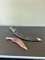 Overall shot of both blades in their scabbards
