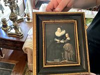 front view of framed portrait showing image detail and frame style