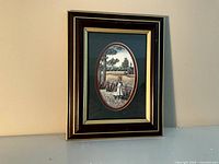 Front view of framed print showing artwork, frame, mat