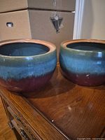 Both ceramic gradient planters side by side