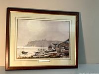 Full view of framed giclée print showing image, mat, frame and title plaque