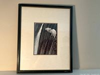 Full view of framed print with mat and black frame