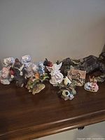 Group shot of all nine figurines on tabletop