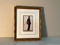 Framed art print showing entire frame and matted artwork