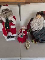 Group shot of all four figurines on tabletop