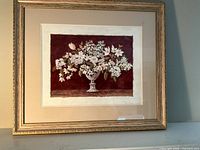 Full view of framed floral still life print
